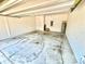 Spacious two-car garage showing water heater at 3333 Wauseon Dr, St Cloud, FL 34772