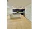 Spacious kitchen featuring a large island, stainless steel appliances, and ample countertop space at 3333 Wauseon Dr, St Cloud, FL 34772