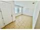 Bright living room features tile flooring, natural light and a minimalist aesthetic at 3333 Wauseon Dr, St Cloud, FL 34772