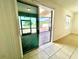 View of the patio through sliding glass doors from the interior, providing an indoor/outdoor transition at 3333 Wauseon Dr, St Cloud, FL 34772