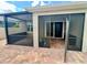 Screened in patio featuring brick pavers and access to the interior via sliding glass door at 3333 Wauseon Dr, St Cloud, FL 34772
