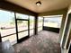 Enclosed patio with brick floor, screen and glass windows providing a relaxing outdoor space at 3333 Wauseon Dr, St Cloud, FL 34772