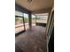 Covered patio featuring brick pavers and enclosed screen to enjoy the outdoor weather at 3333 Wauseon Dr, St Cloud, FL 34772