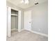 Bright bedroom featuring wood-look floors and a large closet at 3362 Janet St, Apopka, FL 32712