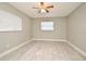 Comfortable bedroom with ceiling fan and neutral walls at 3362 Janet St, Apopka, FL 32712