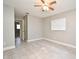 Bright bedroom featuring a ceiling fan and vinyl plank flooring at 3362 Janet St, Apopka, FL 32712