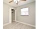 Well-lit bedroom with ceiling fan and neutral decor at 3362 Janet St, Apopka, FL 32712