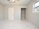 Bedroom featuring a ceiling fan and tile flooring at 3362 Janet St, Apopka, FL 32712