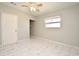 Well-lit bedroom with ceiling fan and tile flooring at 3362 Janet St, Apopka, FL 32712