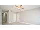 Bedroom with gray walls, wood-look floors and ceiling fan at 3362 Janet St, Apopka, FL 32712