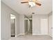 Living room with gray walls, wood-look floors, and ceiling fan at 3362 Janet St, Apopka, FL 32712