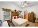 Cozy bedroom with a built-in shelving unit and ample closet space at 3425 Suzette Dr, Kissimmee, FL 34746