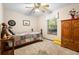 Guest bedroom with wood furniture and a window providing natural light at 3425 Suzette Dr, Kissimmee, FL 34746