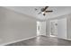 Bright bedroom with double doors opening to additional space at 3650 Se 140Th Pl, Summerfield, FL 34491