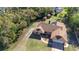 Aerial view of house and surrounding trees at 43 Dahlia Dr, Debary, FL 32713