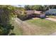 Aerial view of house, yard, and driveway at 43 Dahlia Dr, Debary, FL 32713