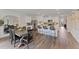 Kitchen and dining area with farmhouse table and seating at 5808 Galloping Dr, Apopka, FL 32712