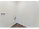 Simple laundry room with washer and dryer hookups at 5808 Galloping Dr, Apopka, FL 32712