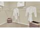 Walk-in closet with ample hanging space and shelving at 5847 Galloping Dr, Apopka, FL 32712