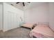 Spacious bedroom with twin beds and a large closet at 6324 Chirpine Ln, Saint Cloud, FL 34771