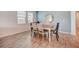 Bright dining room featuring a wood table and chairs, perfect for Gathering meals at 6324 Chirpine Ln, Saint Cloud, FL 34771