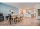 Dining area with table and chairs near the kitchen at 6324 Chirpine Ln, Saint Cloud, FL 34771