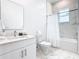 Clean bathroom with a tub, shower, and vanity at 653 Trikomo Dr, Davenport, FL 33896