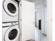 Stackable washer and dryer in a convenient laundry room at 653 Trikomo Dr, Davenport, FL 33896