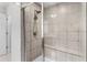 Walk-in shower with built-in seat at 671 Bloom Ter, Davenport, FL 33837