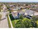 Aerial view of a house in a residential neighborhood with a large backyard at 7202 Chelsea Harbour Dr, Orlando, FL 32829