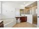 Main bathroom with corner tub, double vanity, and a walk-in shower at 7202 Chelsea Harbour Dr, Orlando, FL 32829