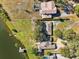 Aerial view of house and property with lake access at 754 E Wildmere Ave, Longwood, FL 32750