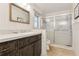 Bathroom with a large vanity, shower, and updated fixtures at 754 E Wildmere Ave, Longwood, FL 32750