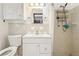 Simple bathroom with single vanity, shower, and updated toilet at 754 E Wildmere Ave, Longwood, FL 32750