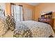 Bedroom with full-size bed and wood floors at 8836 Dunes Ct # 307, Kissimmee, FL 34747