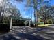 Community carport with pergola and bike rack at 8836 Dunes Ct # 307, Kissimmee, FL 34747