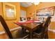 Dining area with dark wood table and six chairs at 8836 Dunes Ct # 307, Kissimmee, FL 34747