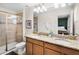 Bathroom with double vanity and granite countertop at 8882 Candy Palm Rd, Kissimmee, FL 34747