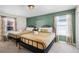 Bedroom with twin beds and boho decor at 8882 Candy Palm Rd, Kissimmee, FL 34747