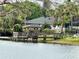 Relaxing gazebo on a wooden dock overlooking a lake at 950 Lake Destiny Rd # E, Altamonte Springs, FL 32714