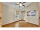 Simple bedroom with wood floors and window at 1004 Chance Cv, Oviedo, FL 32765