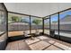 Relaxing screened porch with tiled floor at 1004 Chance Cv, Oviedo, FL 32765