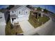 Two-story house with attached garage and driveway at 1053 Waterfall Blvd, Davenport, FL 33837