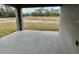 Covered patio with view of backyard at 1304 Hillsborough Ct, Kissimmee, FL 34759