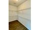 Large walk-in closet with wire shelving at 1304 Hillsborough Ct, Kissimmee, FL 34759