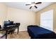 Bright bedroom with window blinds, desk, and a double bed at 1351 Venezia Ct # 304, Davenport, FL 33896