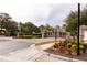 Gated community entrance with landscaping at 1351 Venezia Ct # 304, Davenport, FL 33896