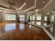 Dance studio featuring hardwood floors and large mirrors at 1351 Venezia Ct # 304, Davenport, FL 33896