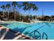 Community swimming pool with spacious deck and lounge area at 1351 Venezia Ct # 304, Davenport, FL 33896