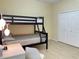 Bedroom with a bunk bed and ample closet space at 142 Winghurst Blvd, Orlando, FL 32828